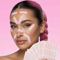 A woman with a pink braid wears TAPETOX anti-wrinkle facial tapes on her forehead and nose while holding a fan of additional patches.