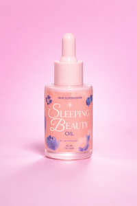 A pink dropper bottle of Skin Supervision Sleeping Beauty facial oil with wild blueberry sits centered against a vibrant pink background.